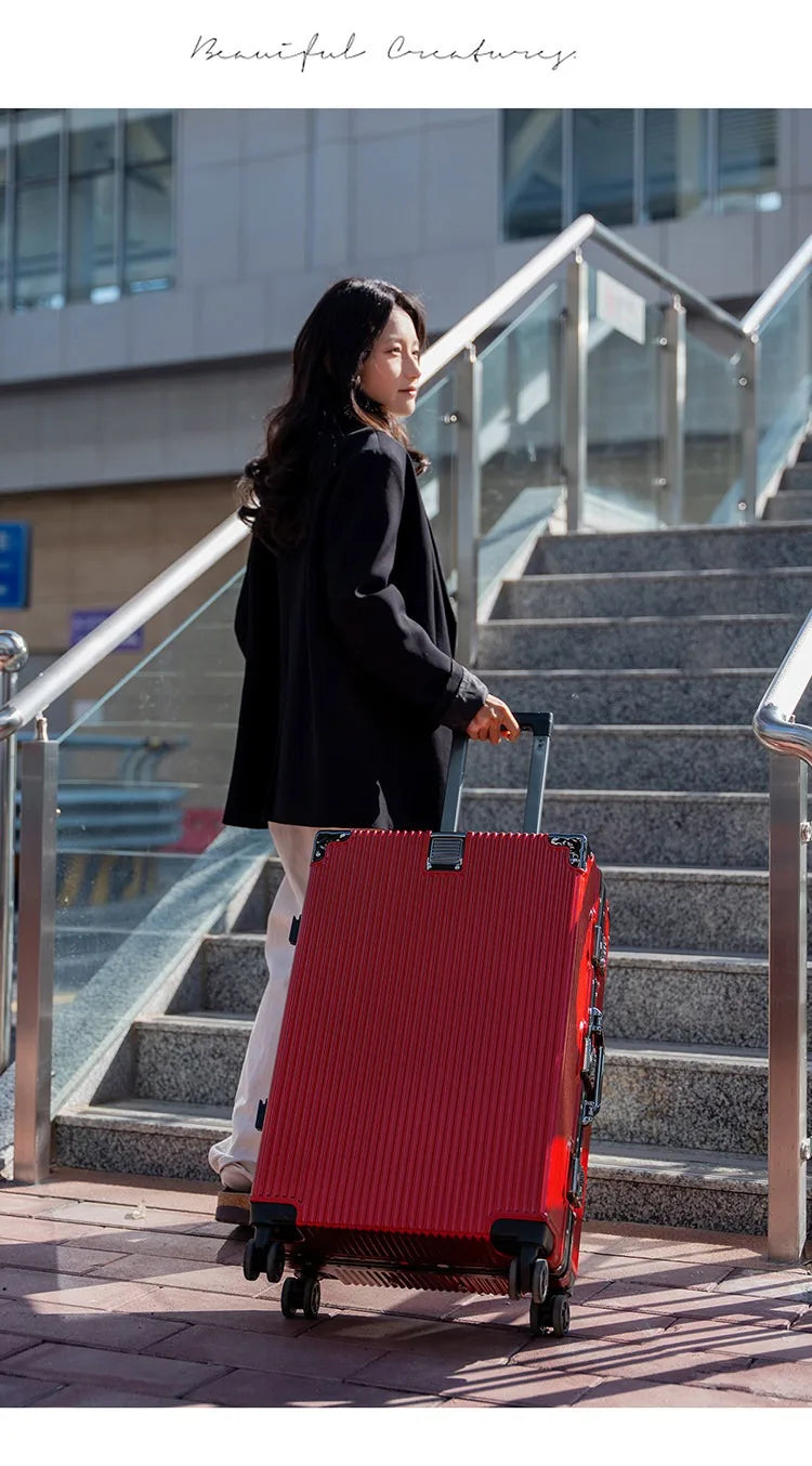 Wolverine luggage, a hard-shell suitcase with 108 rivets, 20-28 inches in size, featuring silent all-terrain wheels, a cup holde
